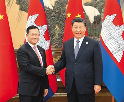 习近平会见柬埔寨首相洪玛奈